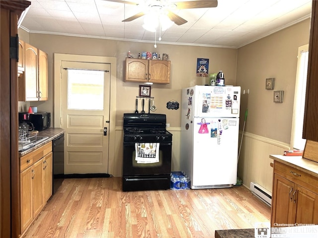 kitchen with ceiling fan, light wood-style flooring, a baseboard heating unit, ornamental molding, and black appliances