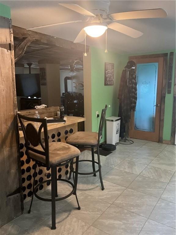 dining area featuring ceiling fan