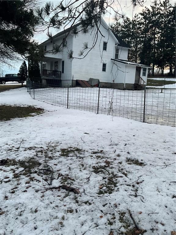 view of yard covered in snow