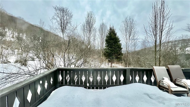 view of snow covered deck