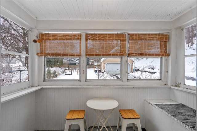 sunroom with wooden ceiling