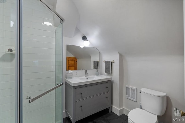 full bath with toilet, a stall shower, vaulted ceiling, vanity, and baseboards