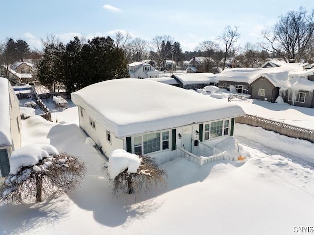 view of snow covered property