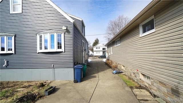 view of side of home featuring crawl space