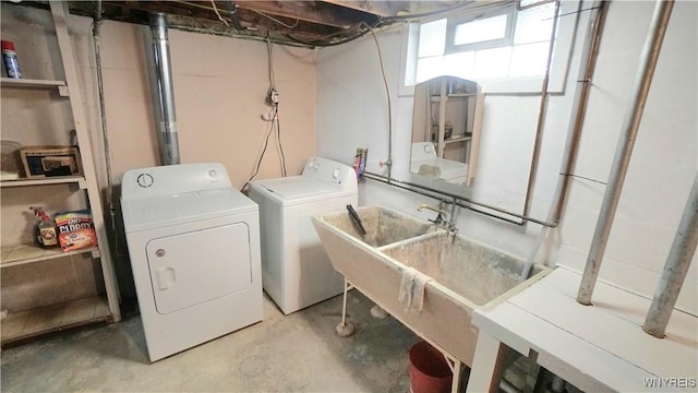 laundry room featuring laundry area and washer and clothes dryer