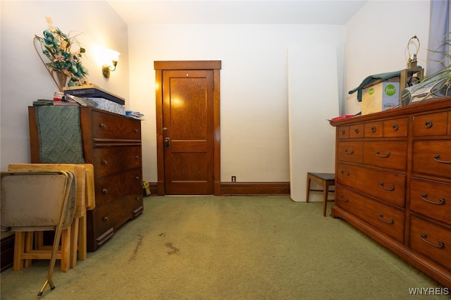 interior space featuring light colored carpet