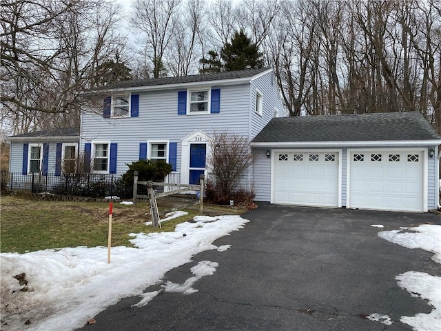 view of front of house featuring driveway and an attached garage