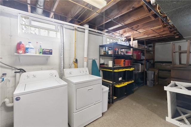 washroom with laundry area and washer and dryer