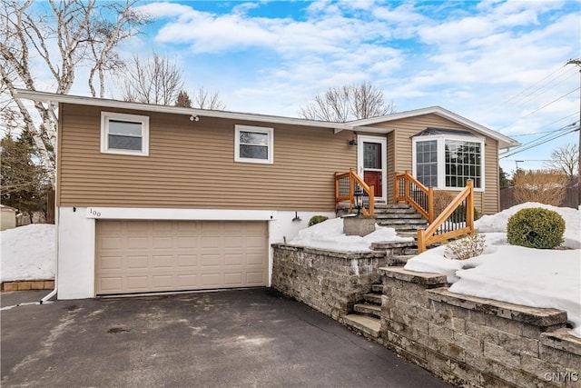 view of front facade with an attached garage and driveway