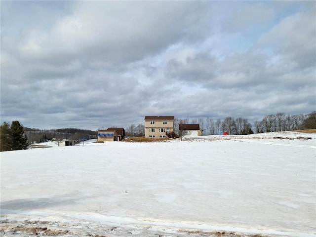 view of yard covered in snow