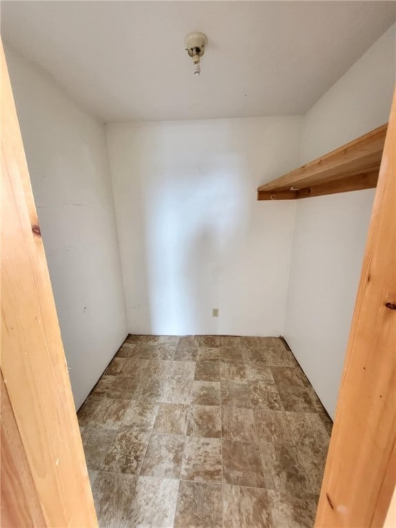 interior space featuring stone finish floor