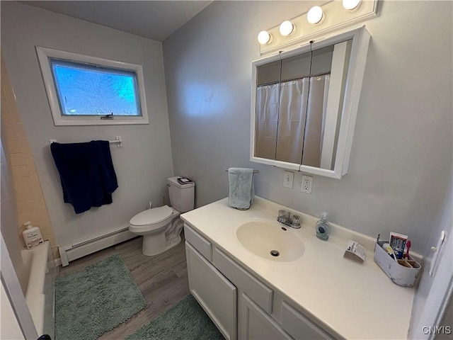 full bathroom featuring a baseboard radiator, toilet, a shower with shower curtain, wood finished floors, and vanity