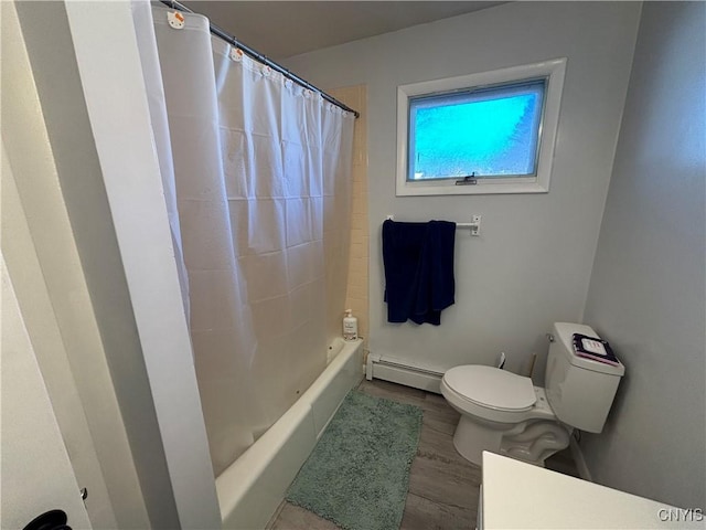 bathroom with wood finished floors, a baseboard radiator, shower / bath combination with curtain, and toilet