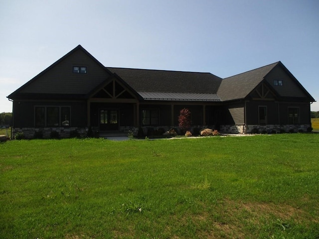 craftsman-style house with a front lawn