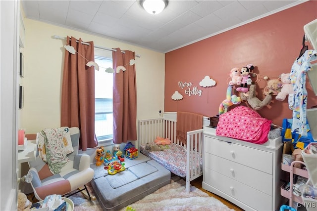 bedroom with crown molding