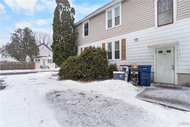 view of snow covered property