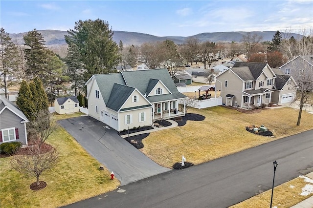 aerial view with a residential view and a mountain view