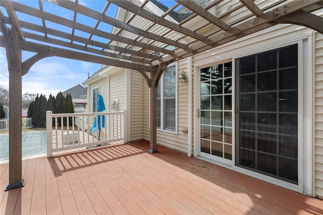 wooden terrace with a pergola