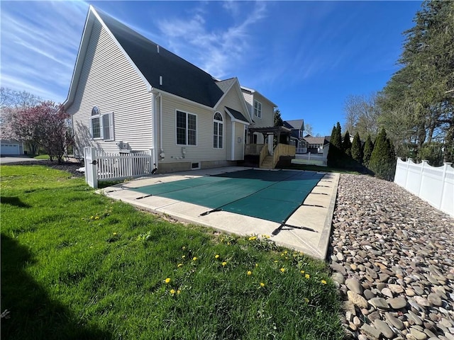 608 Lynhurst Ave, Horseheads, NY 14845 - back of property featuring fence, a fenced in pool, and a yard