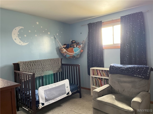 bedroom with baseboards and carpet flooring