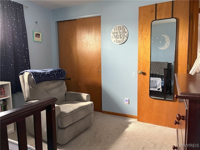 bedroom featuring a closet, carpet flooring, and baseboards