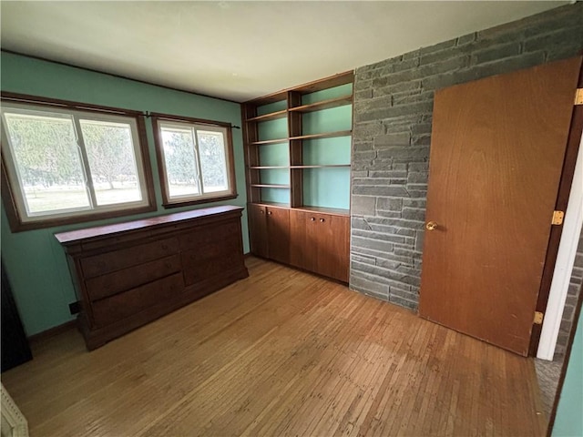 empty room featuring wood finished floors