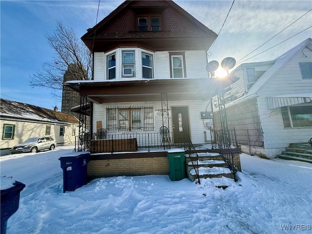 view of front of property featuring covered porch