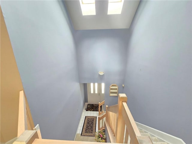 1005 Hillsboro Cove Cir, Webster, NY 14580 - stairway featuring baseboards
