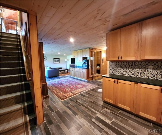 23000 County Route 57, Lyme, NY 13693 - kitchen featuring dark wood-style flooring, dark countertops, wooden ceiling, tasteful backsplash, and recessed lighting