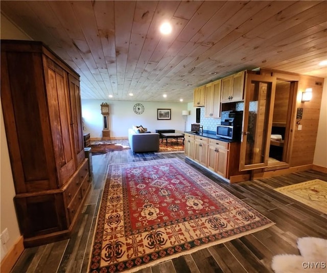 23000 County Route 57, Lyme, NY 13693 - kitchen with dark wood-style flooring, wooden ceiling, stainless steel microwave, recessed lighting, and dark countertops