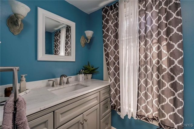 full bath featuring shower / bath combo and vanity