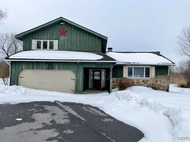 view of front of home featuring a garage and board and batten siding