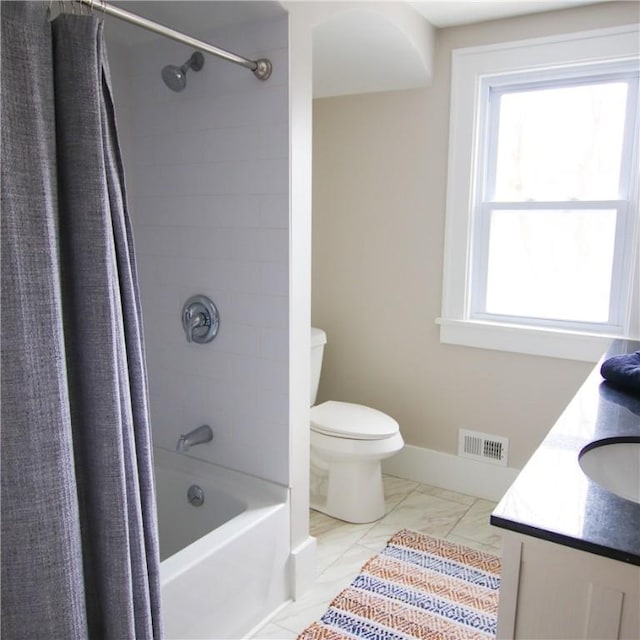 full bath featuring shower / tub combo, a healthy amount of sunlight, visible vents, and vanity