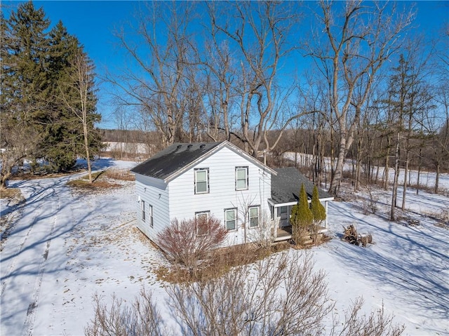 view of snow covered property