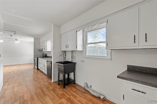 kitchen with tasteful backsplash, electric range, white cabinets, dishwasher, and light wood-style flooring