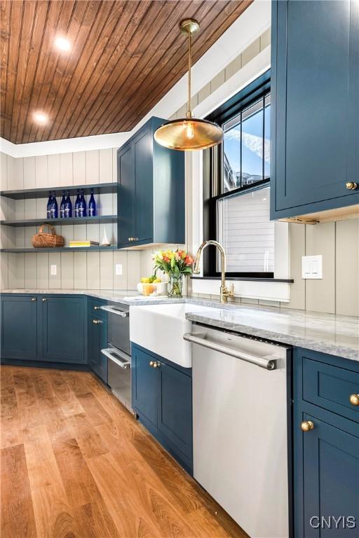 kitchen featuring wooden ceiling, light wood-style flooring, blue cabinets, open shelves, and stainless steel dishwasher