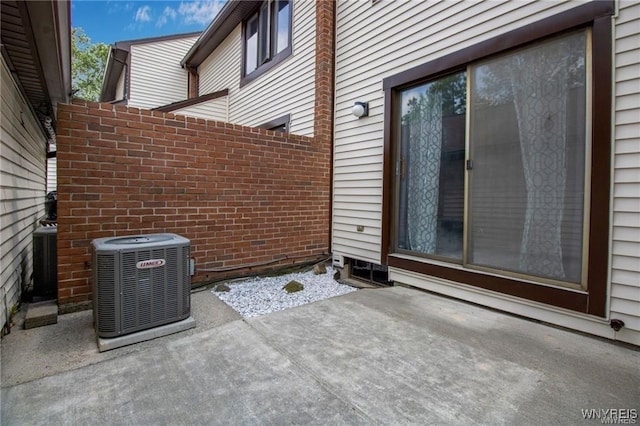 view of patio / terrace featuring cooling unit