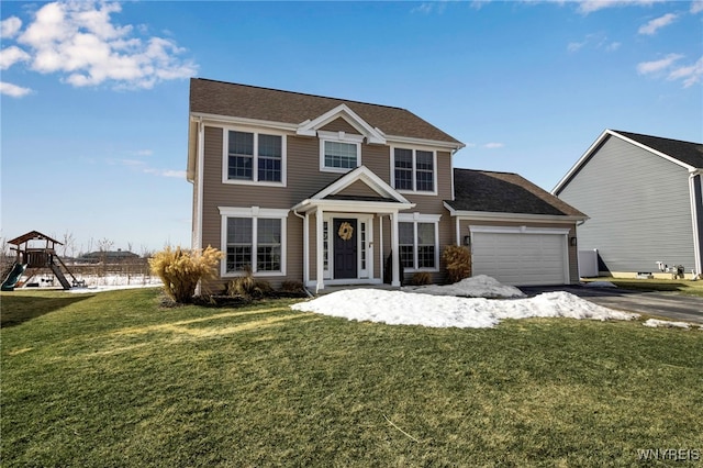 colonial inspired home with an attached garage, driveway, a front lawn, and a playground