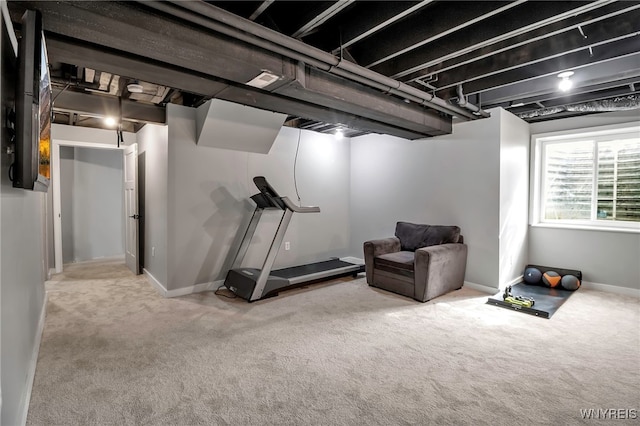 basement with carpet and baseboards