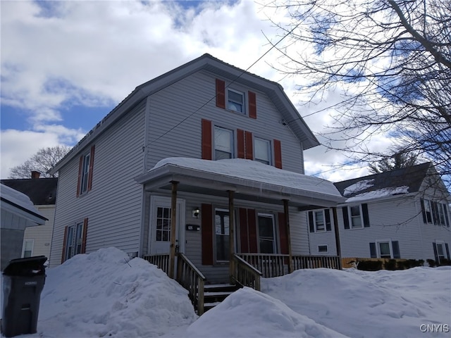 view of front of property featuring covered porch