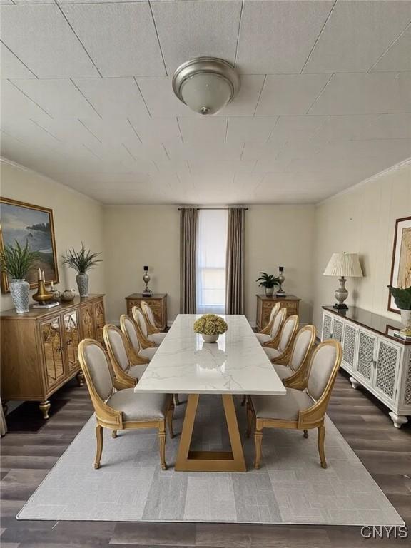 dining space featuring wood finished floors