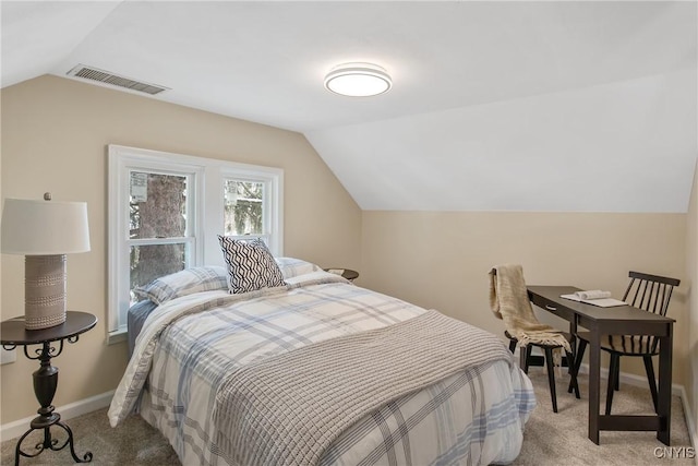 bedroom featuring lofted ceiling, baseboards, visible vents, and light colored carpet