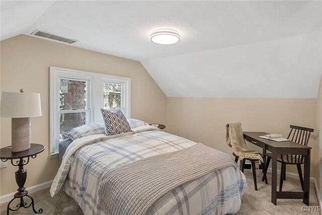 bedroom with lofted ceiling, baseboards, visible vents, and light colored carpet