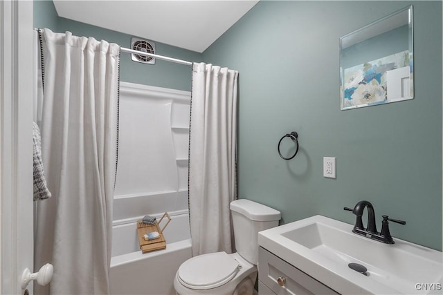 full bathroom with vanity, toilet, and shower / tub combo with curtain