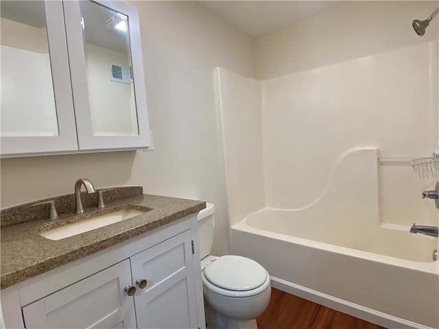 4027 Rockwell Ave, Horseheads, NY 14845 - full bathroom with  shower combination, vanity, toilet, and wood finished floors