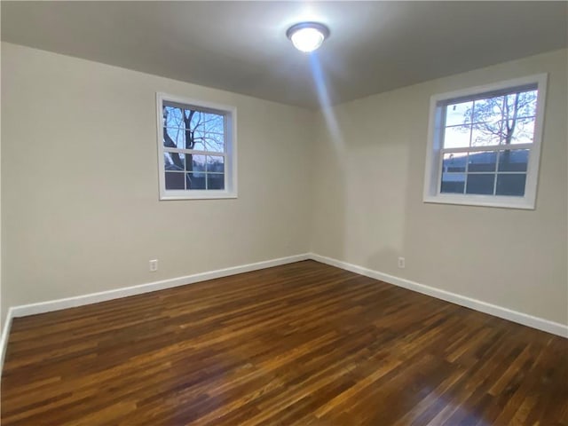 4027 Rockwell Ave, Horseheads, NY 14845 - spare room featuring baseboards and dark wood-type flooring