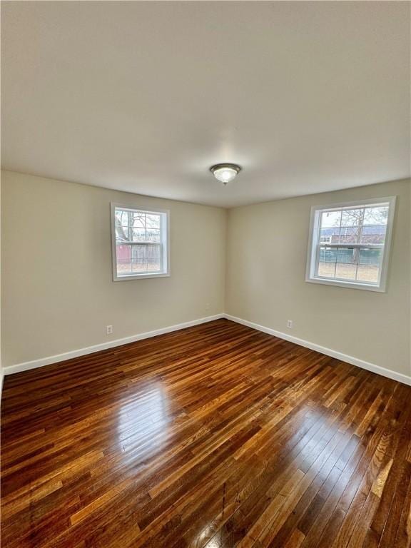 4027 Rockwell Ave, Horseheads, NY 14845 - empty room featuring dark wood-type flooring and baseboards