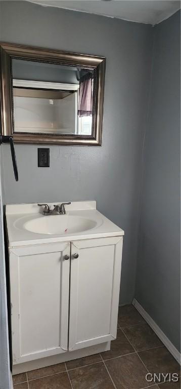 bathroom with vanity and tile patterned floors