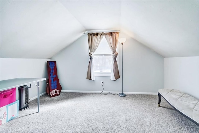 bonus room featuring lofted ceiling, carpet floors, and baseboards