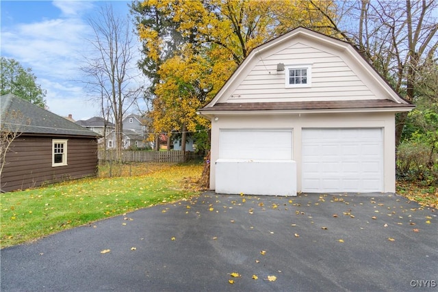 detached garage with fence